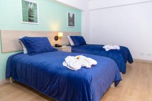 Postel nebo postele na pokoji v ubytování Hotel San Blas