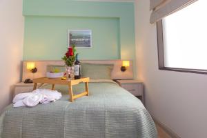 Postel nebo postele na pokoji v ubytování Hotel San Blas
