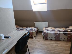 Łóżko lub łóżka w pokoju w obiekcie Pokoje na wynajem Gdańsk