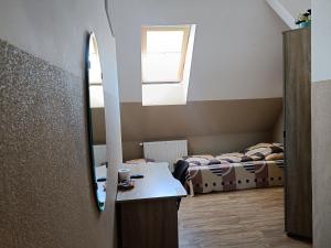 Łóżko lub łóżka w pokoju w obiekcie Pokoje na wynajem Gdańsk