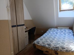 Łóżko lub łóżka w pokoju w obiekcie Pokoje na wynajem Gdańsk