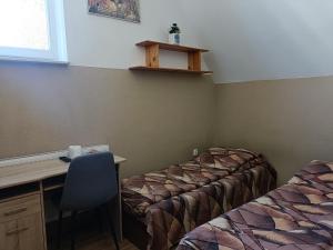 Łóżko lub łóżka w pokoju w obiekcie Pokoje na wynajem Gdańsk