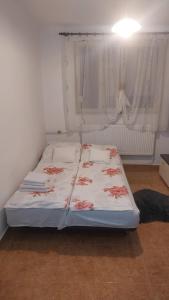 a bedroom with two beds in a room at Cristina's place Arad in Arad