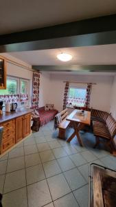 a living room with a couch and a table at Góralski domek na szczycie in Zwardoń +15 photos
