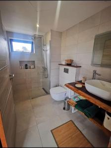 Koupelna v ubytování Villa Flic en Flac proche plage Centre ville