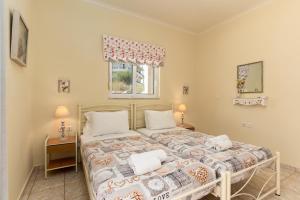 Postel nebo postele na pokoji v ubytování Amarlia Villa + 34 fotografií