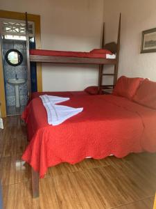 Postel nebo postele na pokoji v ubytování Suítes Casa da Colônia