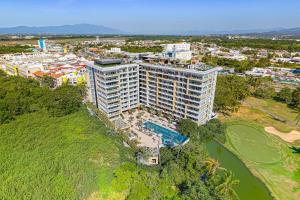 an aerial view of a large building with a pool at V Golf 601 in Puerto Vallarta
