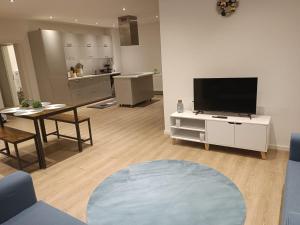 TV a/nebo společenská místnost v ubytování L8 Street - Gneisenaustraße 9