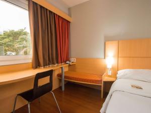 ibis Asuncion tesisinde bir odada yatak veya yataklar