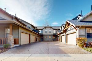 a row of houses with garages at Relaxed on Redstone in Park City