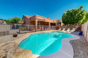 a swimming pool in the backyard of a house at Serenity Now in Glendale