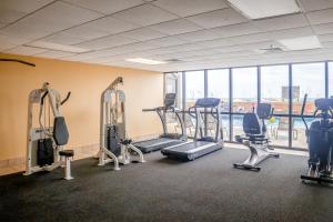 a gym with cardio equipment and a large window at Phoenix IV 4052 in Orange Beach