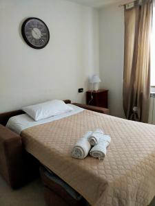 Postel nebo postele na pokoji v ubytování Casa Antonella