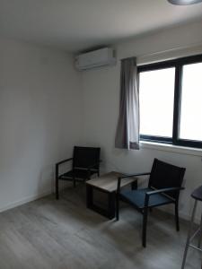 Area soggiorno di NEco apartamentos Naturistas Nudistas Parejas o mujeres solas