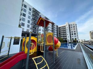 a playground on the roof of a building at Wanderlust Homes @ Armadale Residence in Kuching