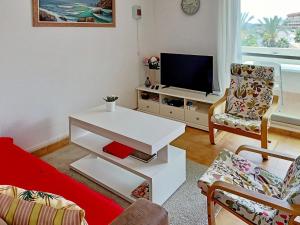 Μια τηλεόραση ή/και κέντρο ψυχαγωγίας στο Sunset Bungalow in Orihuela