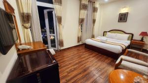 TV a/nebo společenská místnost v ubytování ANH ĐÀO HOTEL