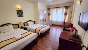 TV a/nebo společenská místnost v ubytování ANH ĐÀO HOTEL