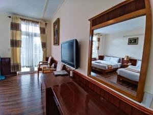 TV a/nebo společenská místnost v ubytování ANH ĐÀO HOTEL