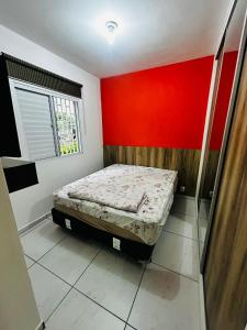 Säng eller sängar i ett rum på Condomínio Vista Politécnica