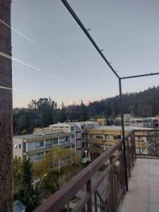 a view of a city from a balcony at Monoambiente hermosa vista in Concepción
