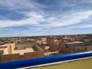 a view of a city from the roof of a building at Birgits Bed & Bistro in Madkhal Meski