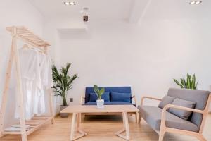 Istumisnurk majutusasutuses Shangri-La Jinwushe Boutique Inn