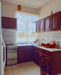 Kitchen o kitchenette sa Cozy apartment to stay - 2bedrooms for 4 guests!