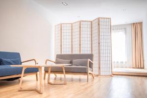 Istumisnurk majutusasutuses Shangri-La Jinwushe Boutique Inn