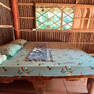 Postel nebo postele na pokoji v ubytování Ecoco Homestay Mekong
