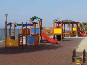 a group of playground equipment in a park at Faliro Athens fully equipped sea view apartment 200m to beach in Athens