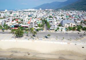 an aerial view of a city with a beach at Sontra Sea Hotel in Danang