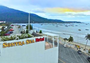 a view of a beach with boats in the water at Sontra Sea Hotel in Danang