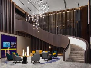 Area soggiorno di Hampton by Hilton Guangzhou Wenchong