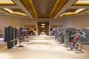 a gym with cardio equipment in a hotel room at Sheraton Grand Macao in Macau