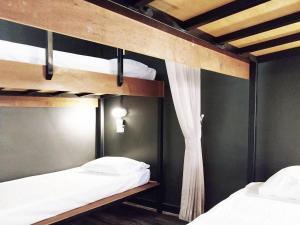 Postel nebo postele na pokoji v ubytování W168 hostel