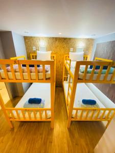 Postel nebo postele na pokoji v ubytování Frutta Hostel