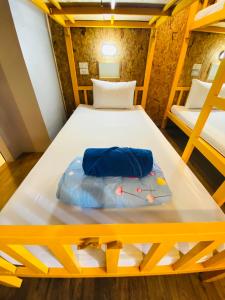 Postel nebo postele na pokoji v ubytování Frutta Hostel
