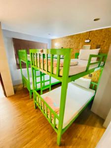 Postel nebo postele na pokoji v ubytování Frutta Hostel