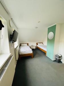 Postel nebo postele na pokoji v ubytování Ferienhaus Cassel