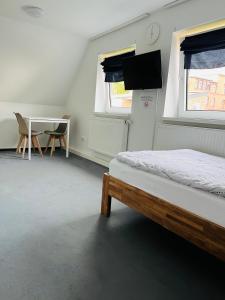 Postel nebo postele na pokoji v ubytování Ferienhaus Cassel