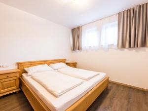 Posteľ alebo postele v izbe v ubytovaní Delightful Apartment in Jochberg with Balcony