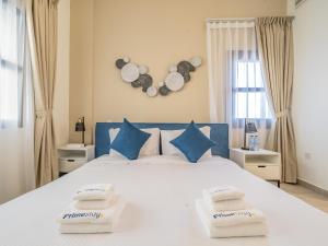 Postel nebo postele na pokoji v ubytování Primestay - Al Andalus H 1 Bedroom, JGE