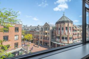 a view of a building from a window at Hermanus Boexstraat in Eindhoven