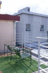 a bench on the roof of a building at Near Gangneung Station House in Gangneung