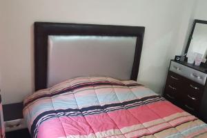Posteľ alebo postele v izbe v ubytovaní Naj Appart TEMARA AL WIFAK