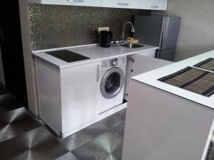 Kuchyň nebo kuchyňský kout v ubytování Sebi Apartment Batumi Towers + 15 fotografií