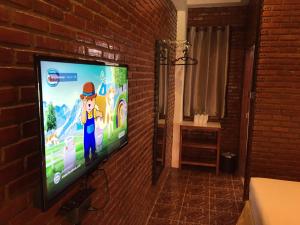 TV a/nebo společenská místnost v ubytování Ben Guesthouse