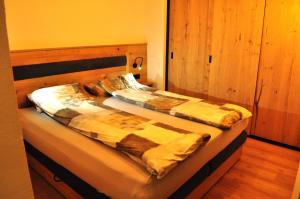Postel nebo postele na pokoji v ubytování Haus Alpenglühn